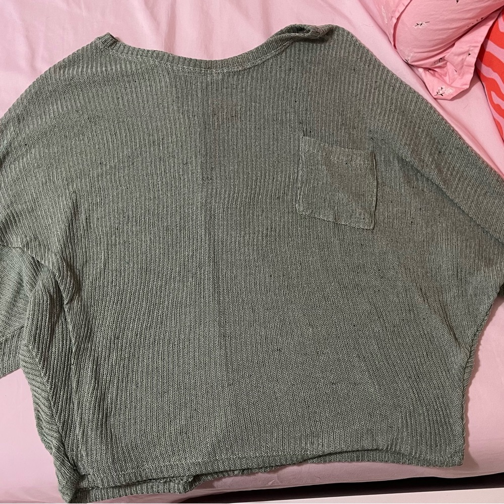 Buckle green long sleeve sweater